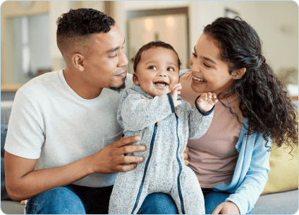 Family holding thier child