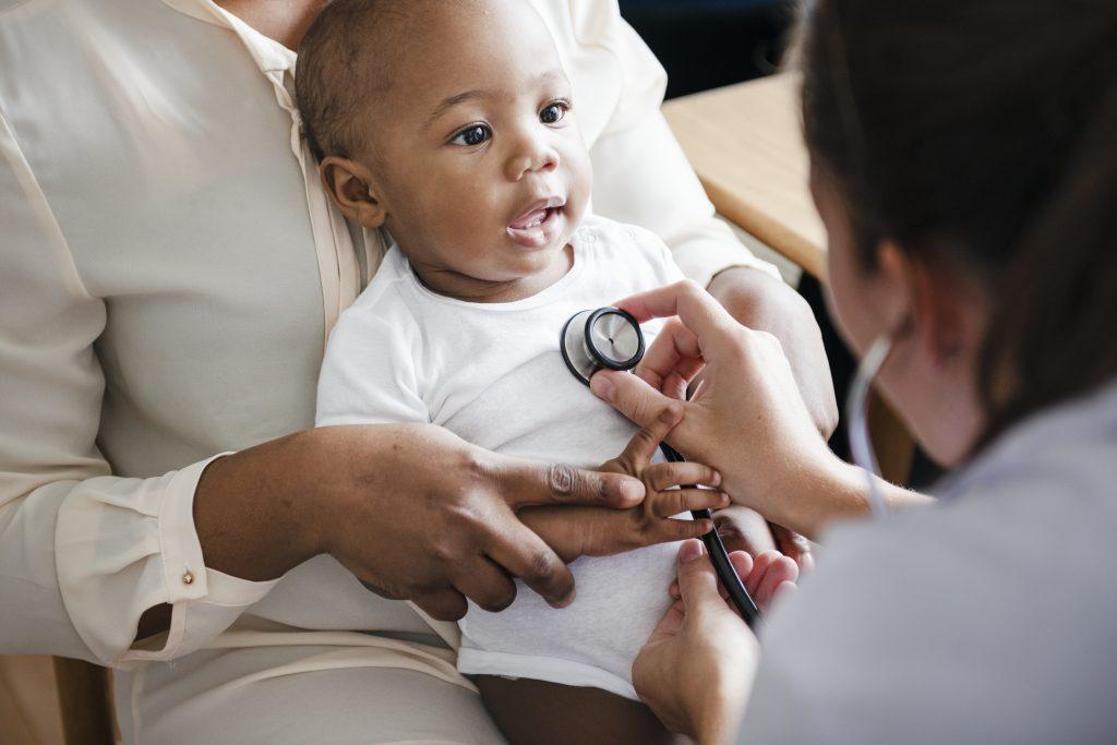 A baby at his first well child visit