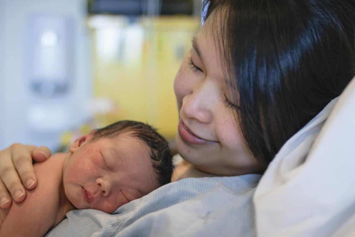 Skin to skin contact between Mom and her newborn baby.