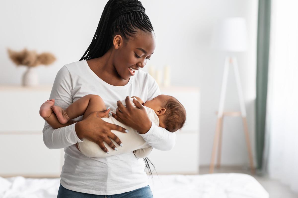 Mom singing to baby. Singing and rhyming helps baby learn!