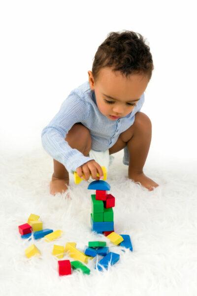 A baby squat is an important motor milestone