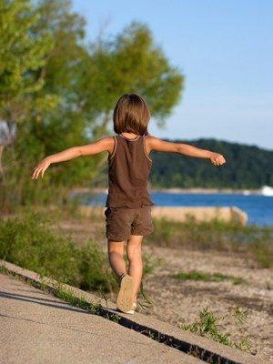 girl_balancing_on_beam