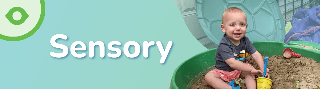 Hero image with the word Sensory next to a photo of a toddler playing in a sandbox.