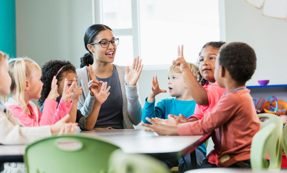 preschool-teacher-and-students-in-classroom