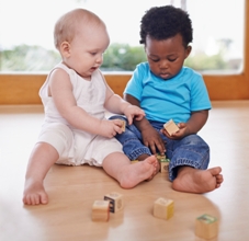 Help baby learn by pairing them up with other babies and encouraging group play