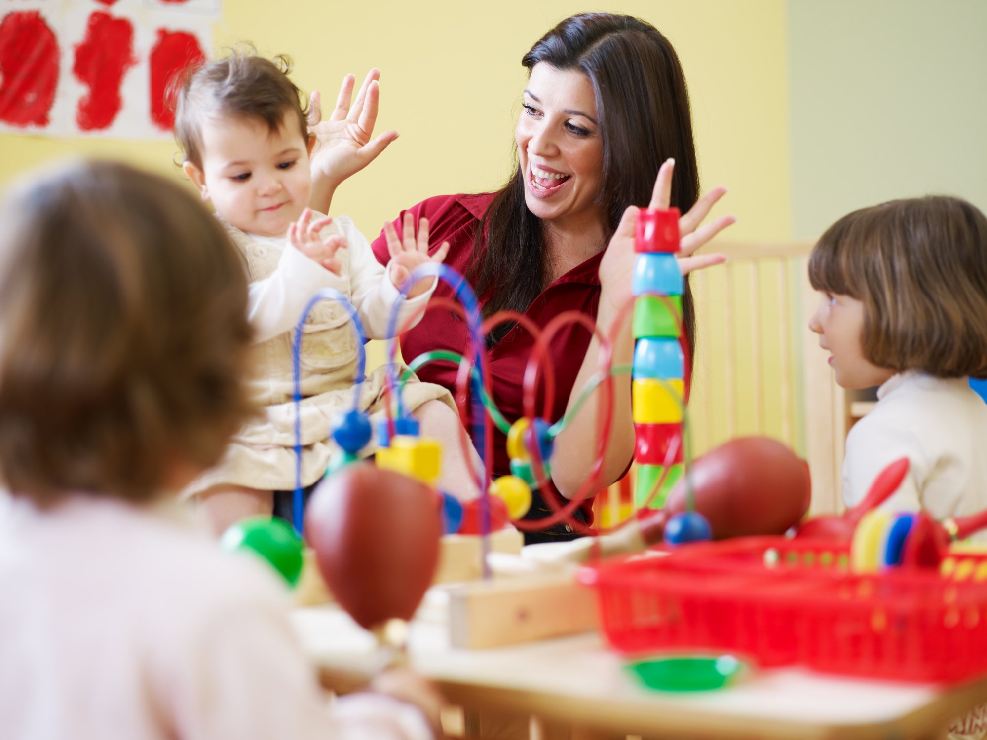 Help babies learn with others at the kindergarten level or at daycare