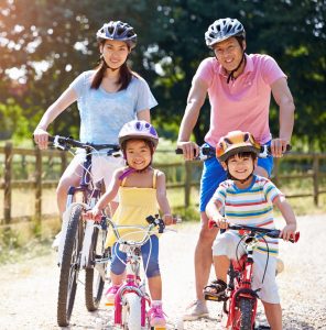 family riding bike together can be a great time for freedom in baby play