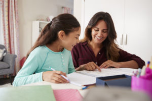 Mother_Helping_Daughter_With_Homework