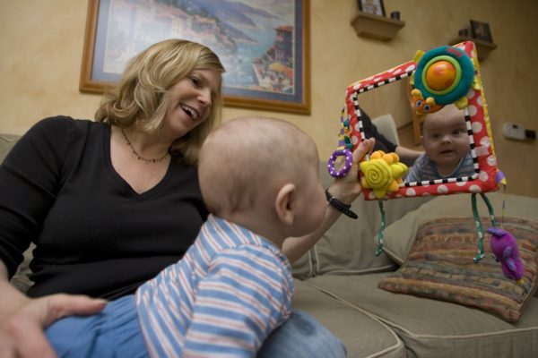 Mirror play can make baby curious about what they look like