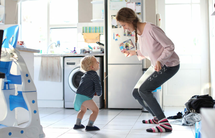 mom_and_toddler_dancing_in_kitchen