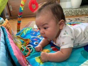 Toys can help with Tummy Time and help baby develop core skills