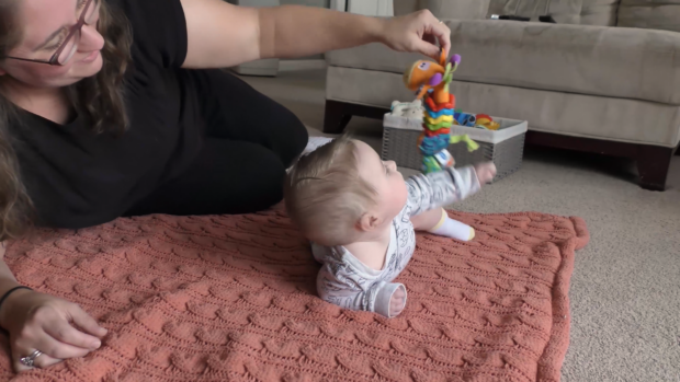 When Can Baby Roll Over? Tips to Help Baby Roll 