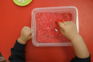 Another fun idea for a valentines day activity is to make a sensory basket for your baby full of fun smells and candy